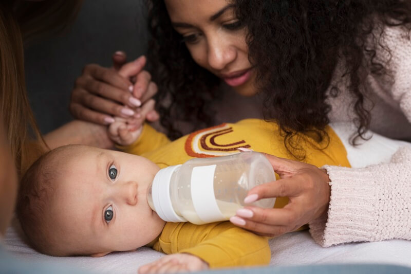 Baby drinking from a bottle
